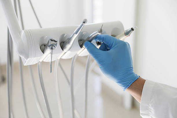 Professional Tooth Extraction technician working in West Point, MS